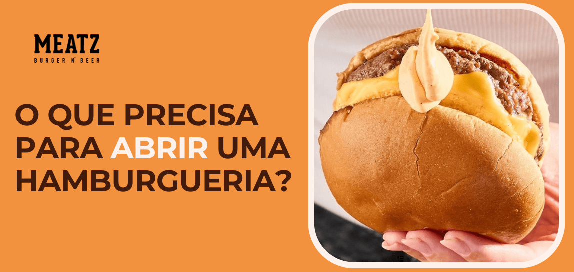 Hambúrguer artesanal com queijo derretido e molho especial sendo segurado na mão ao lado do texto “O que precisa para abrir uma hamburgueria?” da marca Meatz Burger n’ Beer em fundo laranja.
